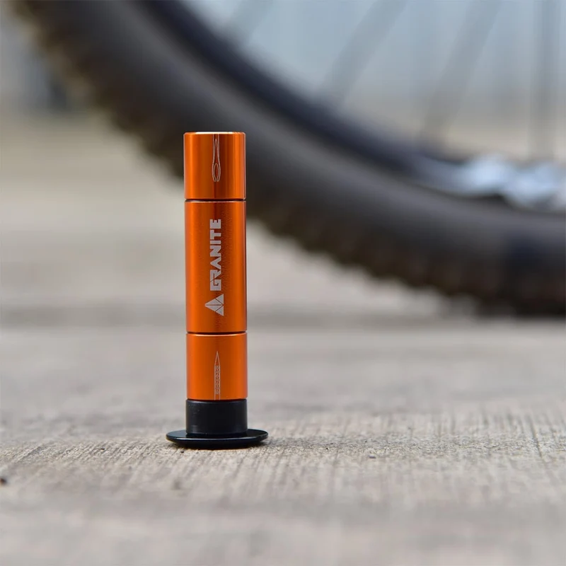Kit de Réparation Tubeless Intégré au Cintre GRANITE DESIGN CNC + 4 Mèches Orange