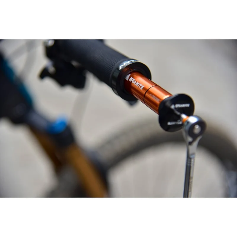 Kit de Réparation Tubeless Intégré au Cintre GRANITE DESIGN CNC + 4 Mèches Orange
