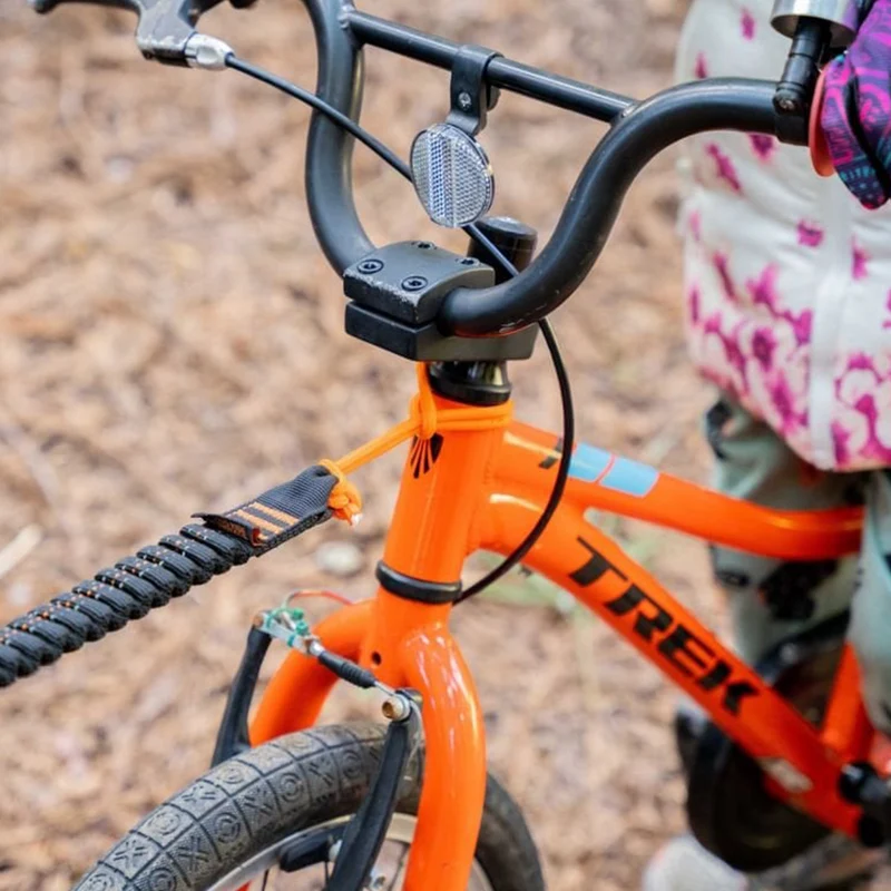 Corde de traction vélo enfant Shotgun Tow Rope sur selle