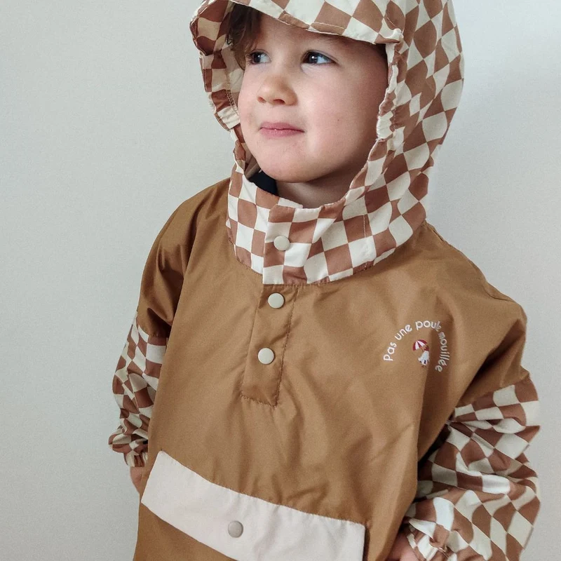 Poncho de pluie Poule Party adulte ou enfant damiers